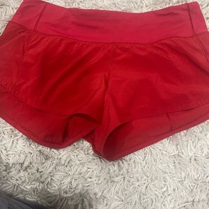 Red Lululemon sport short.